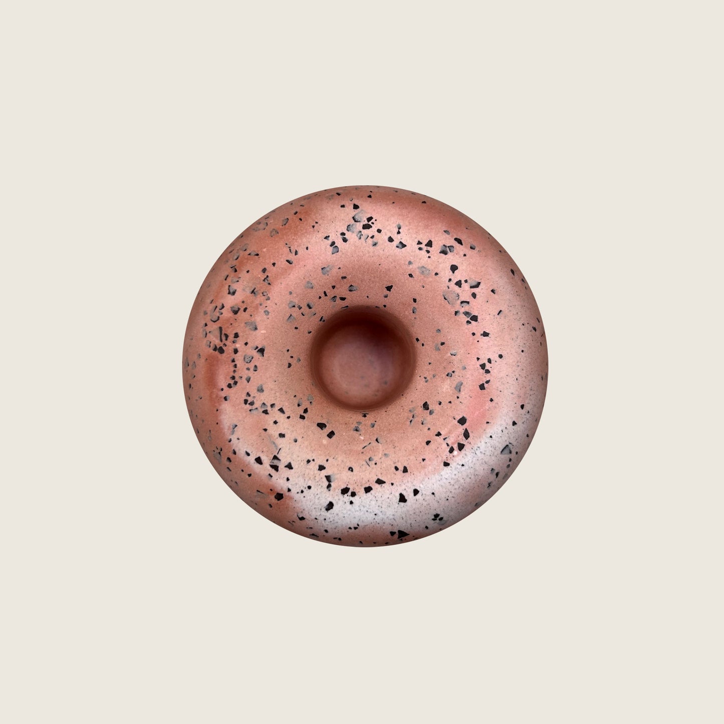 Spotted terracotta donut